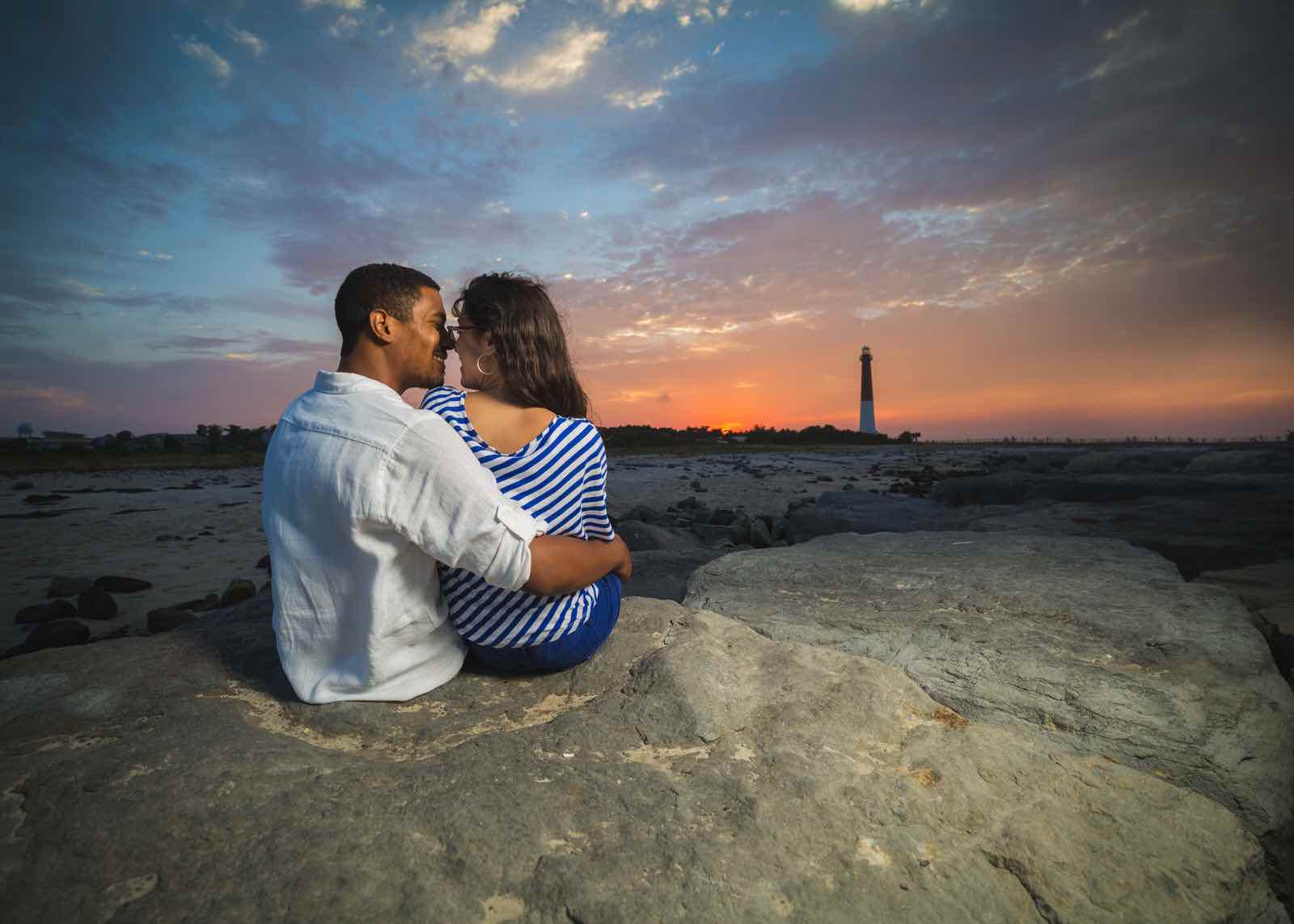 A magical sunset for Deanna and Georges engagement session in Barnagat Light, NJ